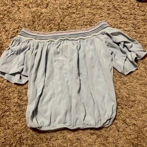 A cute teen light blue crop top.
